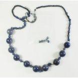A string of lapis lazuli beads - some loose