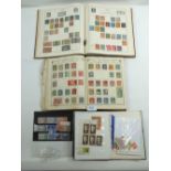 Three All world stamp albums (one A-G, the others a Lincoln and Strand) plus small stockbook &