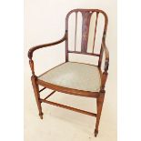 An Edwardian mahogany carver chair with marquetry decoration