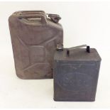 A WWII period military jerry can metal with band marked with 'WD' and 1943 and an Esso oil can