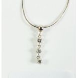 A silver necklace set with triple diamond drop - boxed