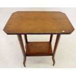 An Edwardian oak two tier occasional table