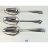 A Georgian silver table spoon and two other silver tablespoons, 174g