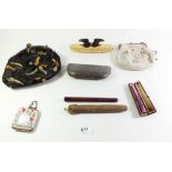 Two cheroot holders, a pair of vintage glasses, nail buffer and two evening bags