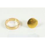 A yellow metal/gold ring marked 553, 4.4g and 18 carat gold cufflink, 3.3g