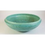 A Royal Lancastrian green pottery bowl, 27cm diameter