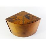 A Japanese marquetry box of segmented form and with slide out interior fitted for cigars, 14cm tall