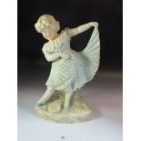A German glazed bisque figurine of a dancing girl in the manner of Gebruder Heubach - 37cm high.