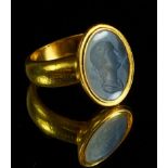 A 19th century high grade gold intaglio ring carved intaglio woman's bust, size U, tested as 23.5 ct