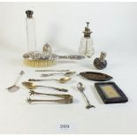 A cut glass perfume atomiser with silver and enamel top and a silver tray and other items