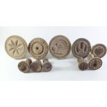 A selection of 19th century to early 20th century treen butter stamps