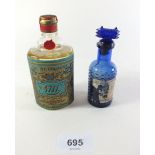 A 4711 Eau de Cologne bottle with original contents sealed and a blue poison bottle.