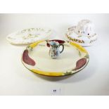 A Poole pottery serving dish and four items of Faience pottery