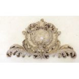 An antique stone effect foliate cartouche a/f