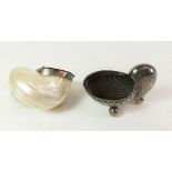 A mother of pearl shell form snuff box with white metal lid together with a plated shell form salt