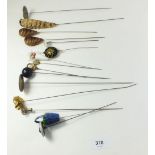 A quantity of various hat pins