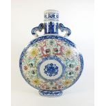 A late 19th century Chinese moon flask vase with dragon and floral decoration, 35cm tall