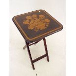 A marquetry topped folding occasional table