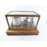 An early 20th century oak cased barograph, by R & J Beck of 68 Cornhill London, with 8 section