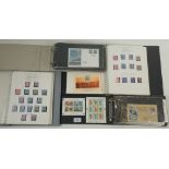 A box of QEII Isle of Man mint and used defin/commem and postage due in 2 albums and on cover,