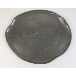 A Kayserzinn pewter Art Nouveau tray decorated poppy, 24.5cm diameter