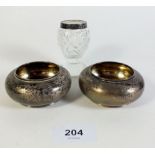 A pair of American sterling silver salts by Gorham with engraved decoration 149g and a silver and