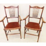 A pair of Edwardian mahogany carver chairs with marquetry decoration