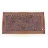 A late Victorian floral carved panel 75 x 39cm