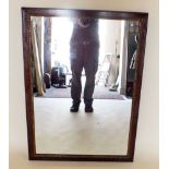 A large oak framed mirror with gilt inner moulding 100 x 73cm