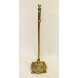 A large 19th century brass standard lamp with decorative base, 117cm, unextended