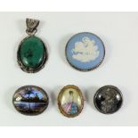 A selection of pendants and brooches including some butterfly pendants etc