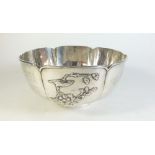 1. A Chinese silver bowl with applied bamboo, flower and bird decoration, 407g, 19cm diameter