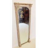 A 19thC gilt gesso and pine full length mirror in the neo classical style, 134cm high.