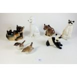 A collection of seven Lomonosov USSR animal figurines to include bears, wrens etc