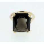 A 9ct gold and smokey quartz ring - size I.