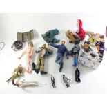 A collection of Action man dolls and accessories
