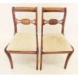 A pair of late 19th century mahogany bar back dining chairs