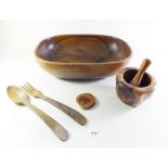 A large wooden serving bowl and a smaller one etc.