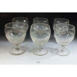 A set of six late 19thC glass brandy rummers with facet cut bowls.