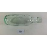 A 19th century glass round bottomed mineral water bottle moulded 'Talbot & Co' Gloucester