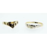 A 9 carat gold wishbone ring 1.2g and an 18 carat gold ring set chip diamonds 2.5g