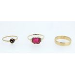 Three 9 carat gold rings, two with stones, total weight 4.5g