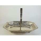 A silver basket with pierced border, 390g