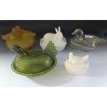 Five various animal topped glass pate tureens