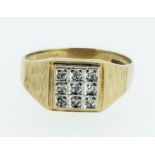 A 9 carat gold retro ring of diamond chipped grid design on textured shoulders, 2.7g