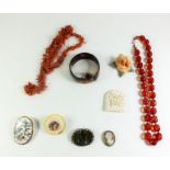 A selection of silver and other brooches including a cameo and a Connemara marble brooch