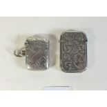 Two silver vesta cases, hallmarked for Birmingham 1901 and Birmingham 1897.