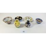 A selection of miniature oriental ceramics including a Japanese scent bottle with silver top.