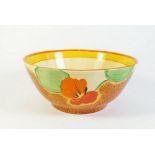 A Clarice Cliff bizarre bowl in the Nasturtium pattern for Newport Pottery, repaired chip to rim,