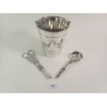 A silver plated ice bucket, a silver plated pair of grape scissors and a Walker & Hall sifter